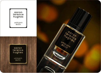 Aaron Terence Hughes black and gold label on a perfume bottle
