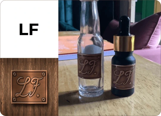 LF copper metal labels on glass perfume and dropper bottles