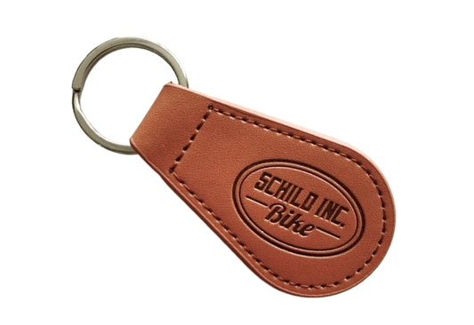 Leather keychain droplet.webp__PID:ef7ae44c-176e-4a23-b687-67dee5f6aac5