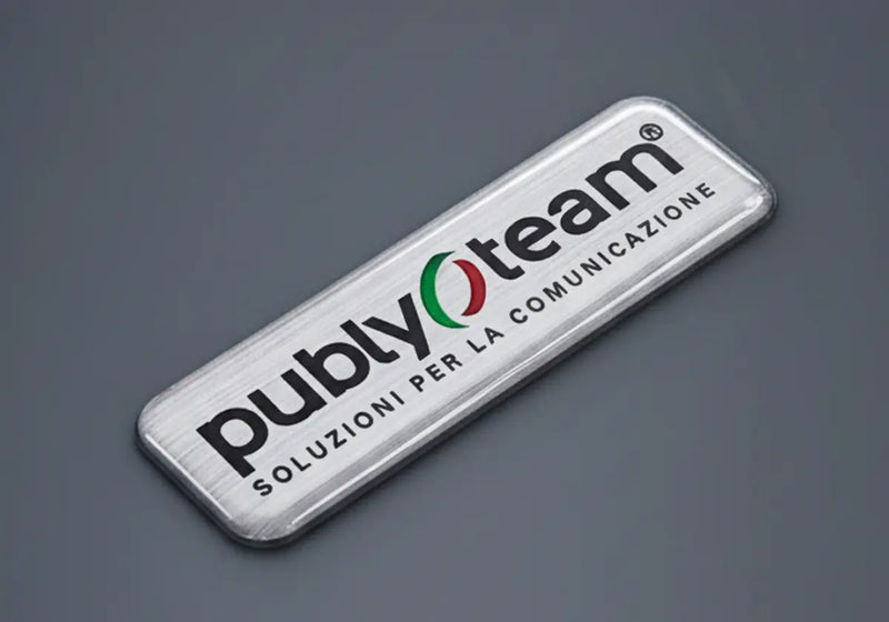 Metallic resin doming label