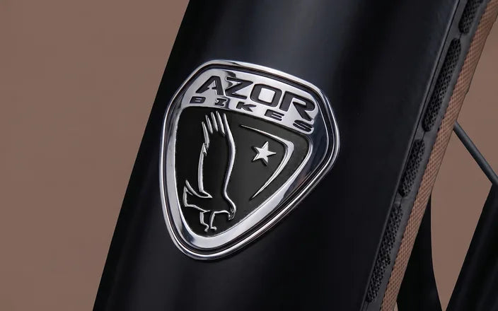 Premium 3D embossed metal label on a bicycle mudguard