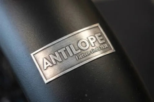 Antilope embossed metal label on a mudguard