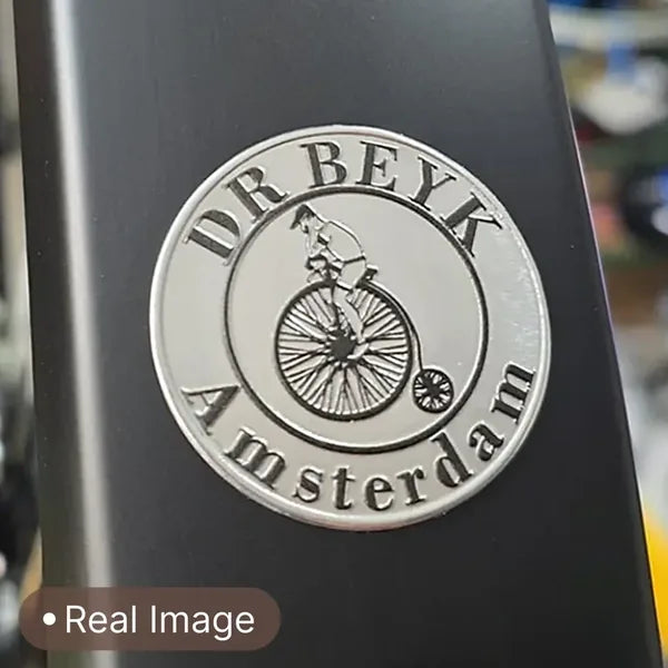 45 mm round metal label on a bicycle mudguard